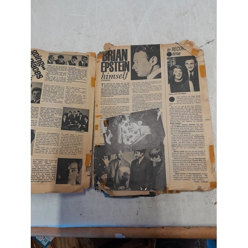 31 - NEMS Enterprises Beatles scrap book full of Beatles newspaper cuttings and related material