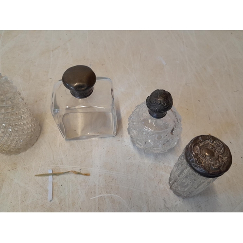 90 - Various silver lidded scent bottles, dressing table jars etc. some with damaged lids