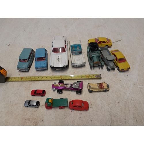 137 - Assorted die cast collectable cars, some Corgi and others, all play worn