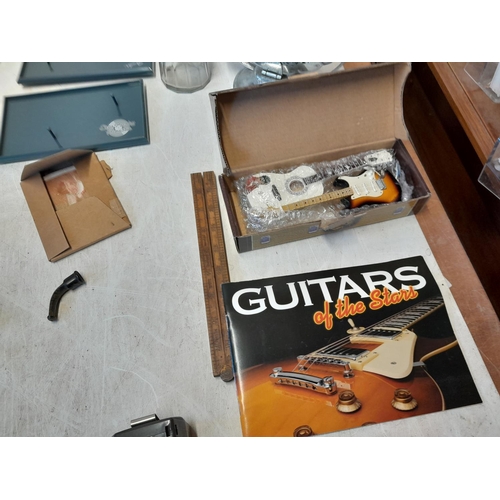 151 - Box of oddments : Guitars of the Stars, empty Bells Wade decanter, plated ware etc., Wade Whimsies