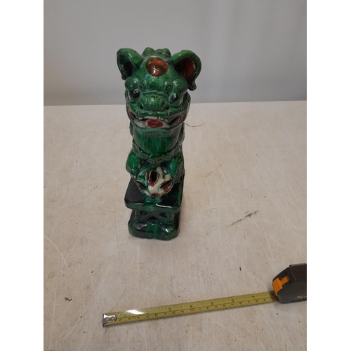 215 - Chinese Tang style pottery figure of a Dog Au Feu