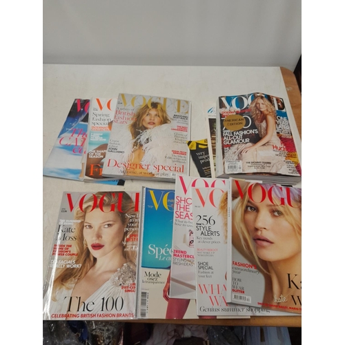 302 - Various edition of Vogue magazine