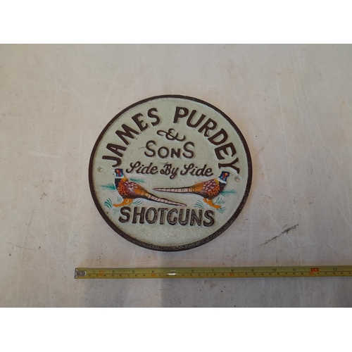 377 - Modern painted Purdey and Sons cast iron advertising sign