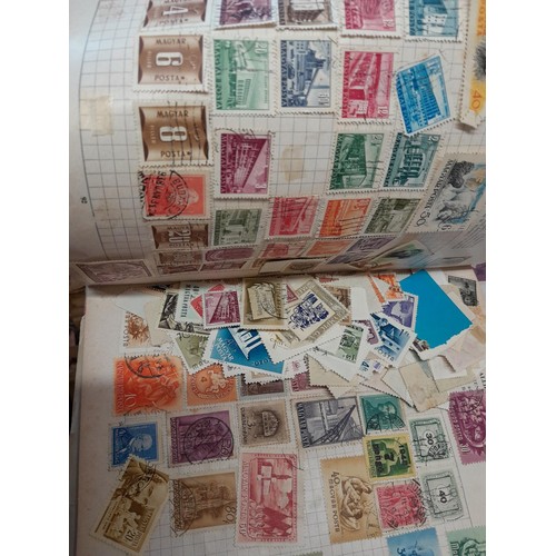 378 - Stamps as kiloware new and used in stock book, Schoolboy stamps of the world etc.