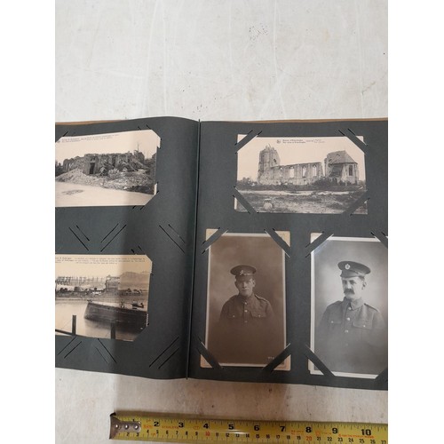 574 - An album of black and white military interest postcards, World War I and War II interest