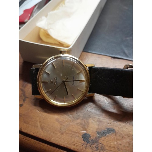 423 - Gent Omega Automatic Seamaster with 18ct gold case, original leather strap in running order but no g... 