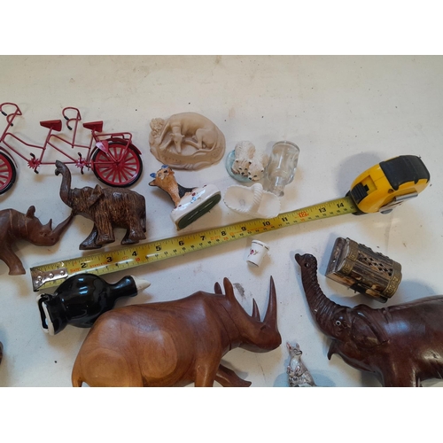 35 - Assorted ornaments : wooden elephants, pottery cats and dogs, resin figure etc.