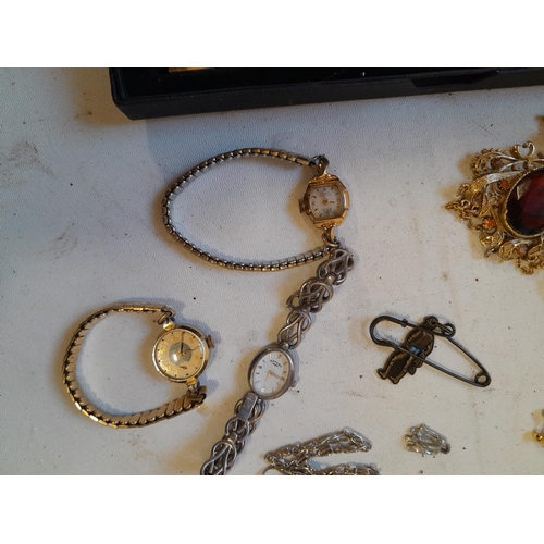 42 - Assorted costume jewellery and watches