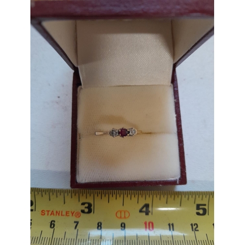 45 - 9 t gold ring set with two small diamonds and single ruby size N, 1.1 g