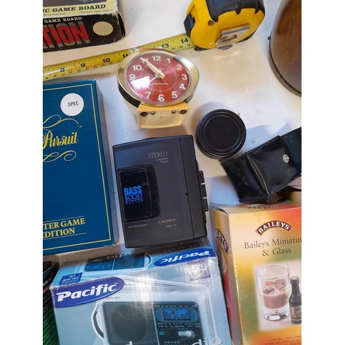 82 - Box of oddments : Cheetah 125 boxed joystick, games puzzles, camera teleconverter, Crown Walkman, tr... 