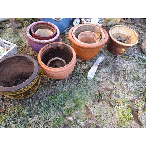 89 - Various garden terracotta and other pots, glazed elephant stool