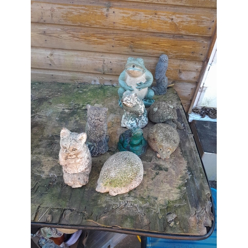 100 - Composite stone garden ornaments and terracotta and other pots