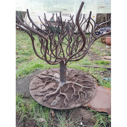 114 - Artisan made iron base glass top garden table modelled as Tree of Life, base is very heavy