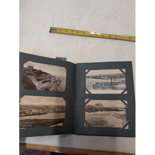 170 - Album full of early 20th century coloured and black and white postcards all relating to Cornwall