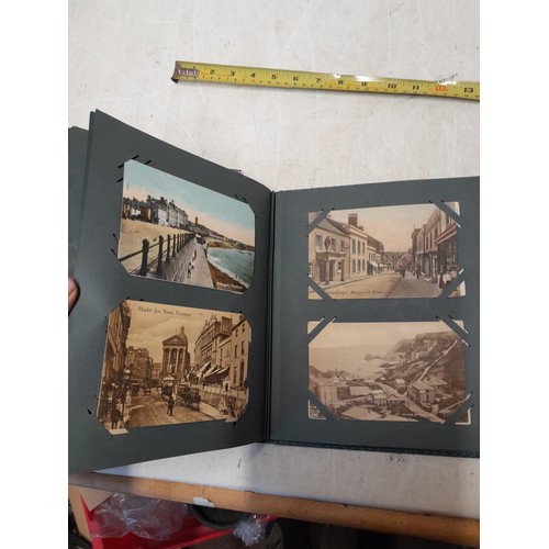 170 - Album full of early 20th century coloured and black and white postcards all relating to Cornwall