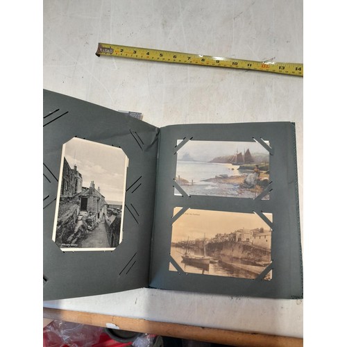 170 - Album full of early 20th century coloured and black and white postcards all relating to Cornwall