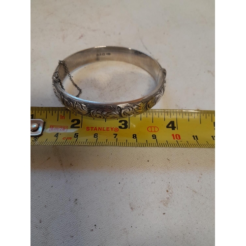 389 - Engraved silver hinged bangle