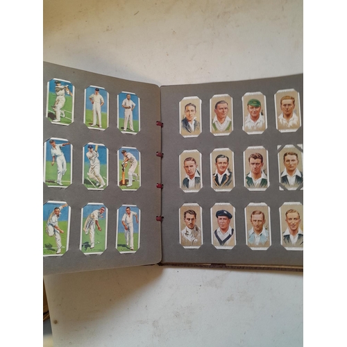 396 - A sporting themed collection of cigarette cards