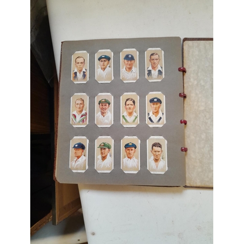 396 - A sporting themed collection of cigarette cards