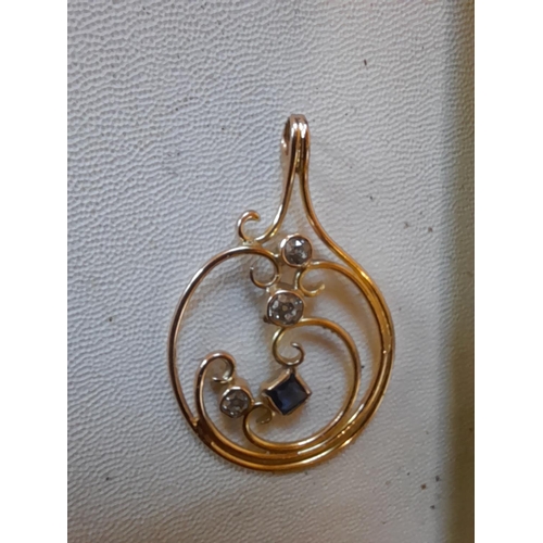 38 - Hallmarked 9 ct gold pendant set with sapphire and three diamonds, chain not included 6. 4 g, larges... 