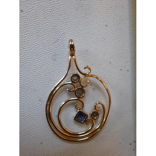 38 - Hallmarked 9 ct gold pendant set with sapphire and three diamonds, chain not included 6. 4 g, larges... 