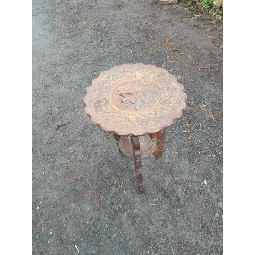 106 - Early 20 th century carved oak table with lion decoration