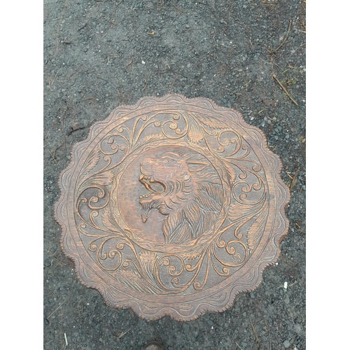 106 - Early 20 th century carved oak table with lion decoration