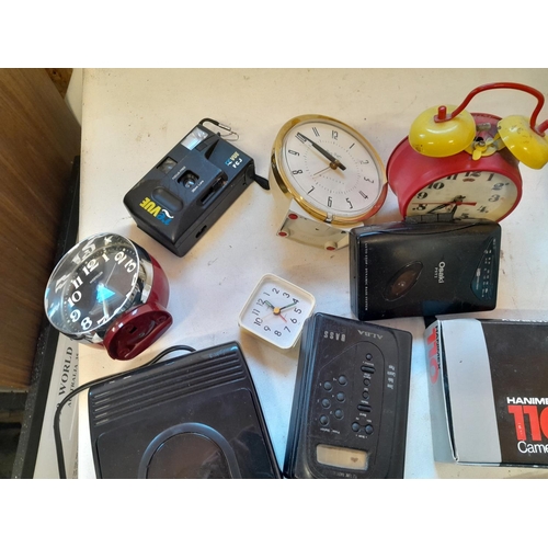 176 - Vintage alarm clocks, radios, etc.