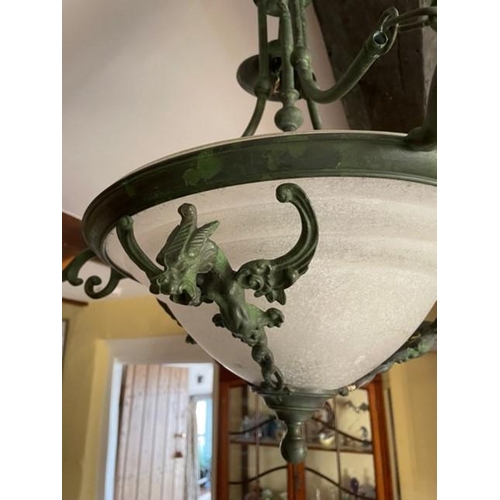 367 - Hanging pendant light with glass shade and dragon motifs