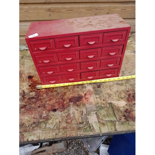 55 - Red painted nest of metal drawers