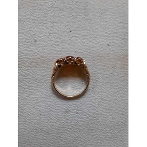 69 - Clearly hallmarked 9 ct gold ring set with three graduated hardstones size K - L, 2.5 g