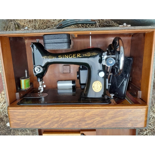 138 - Vintage Singer sewing machine in hardboard case