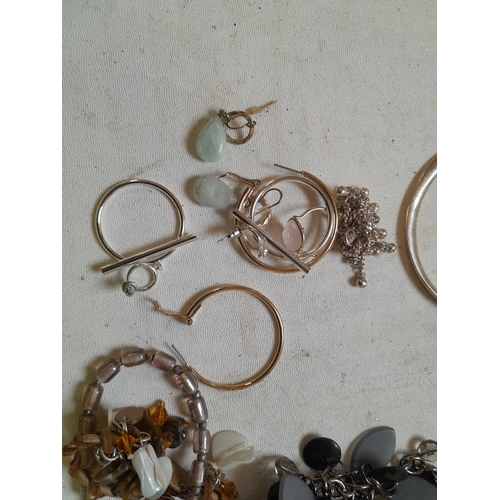 163 - Costume jewellery , very small amount of silver included