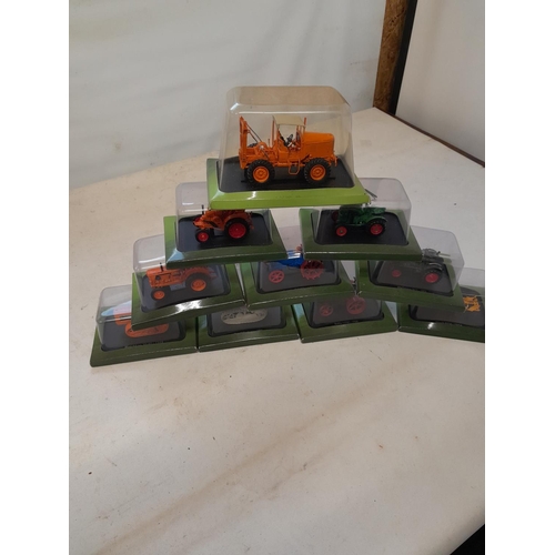 186 - 10 x die cast collectable toy tractors by Hatchette Part Works