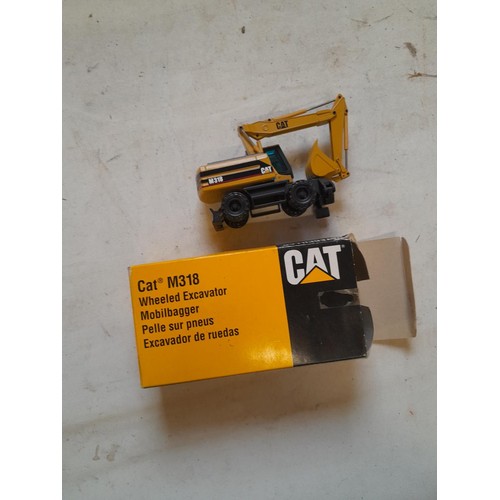 202 - Die cast toy car : Norscot Cat Wheeled Excavator