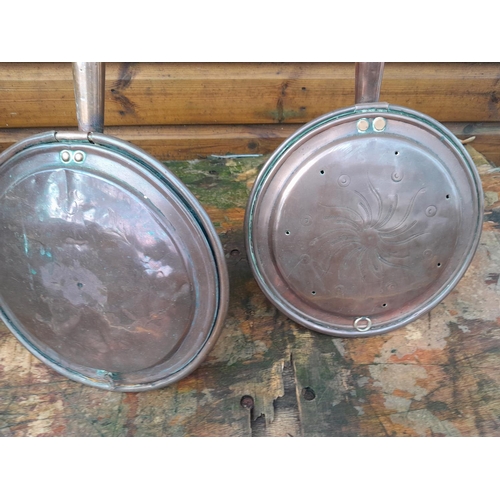 284 - 2 x 19th century copper warming pans with wriggle work decoration