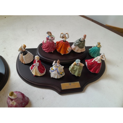 28 - Royal Doulton figurines on display stand, miniature size