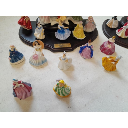 28 - Royal Doulton figurines on display stand, miniature size