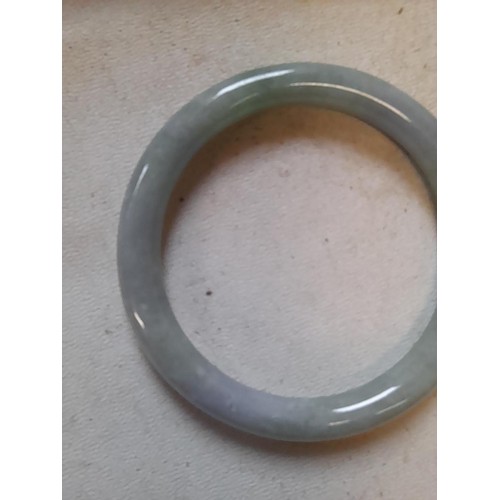 82 - Chinese jadeite bangle with blue - mutton fat colouring