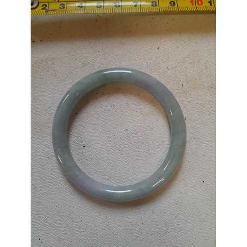 82 - Chinese jadeite bangle with blue - mutton fat colouring