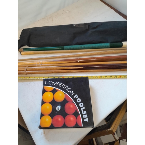 171 - Box set of pool balls and snooker / pool cues