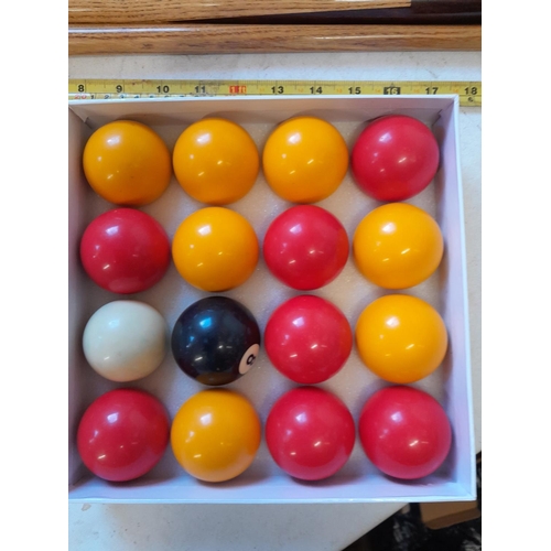 171 - Box set of pool balls and snooker / pool cues