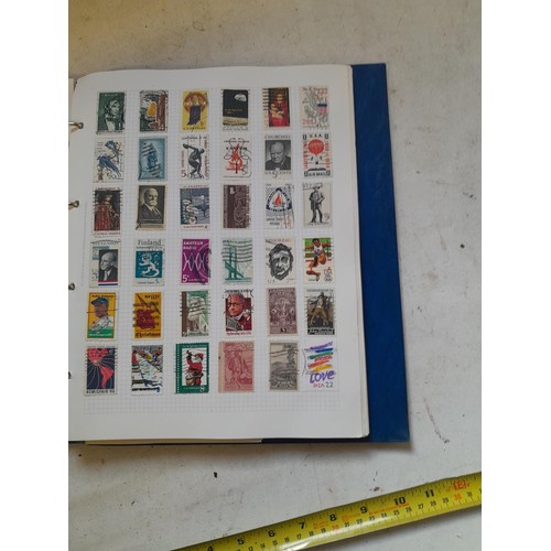 127 - Empty SG Windsor album and album of Stamps of the world mainly offered used, US interest