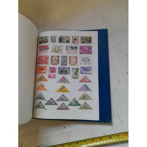 127 - Empty SG Windsor album and album of Stamps of the world mainly offered used, US interest