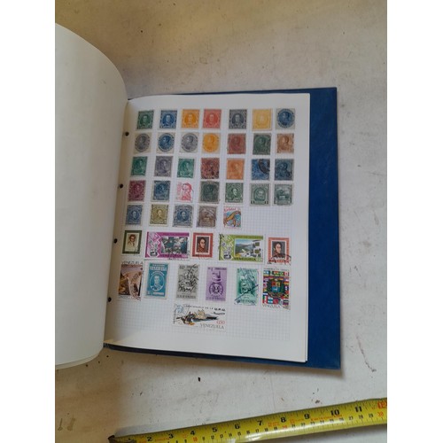 127 - Empty SG Windsor album and album of Stamps of the world mainly offered used, US interest