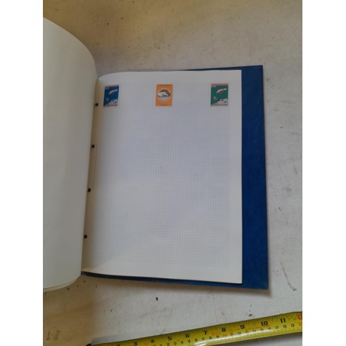 127 - Empty SG Windsor album and album of Stamps of the world mainly offered used, US interest