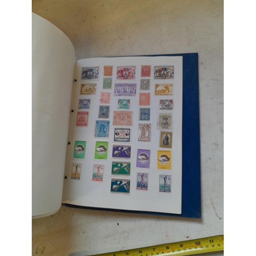 127 - Empty SG Windsor album and album of Stamps of the world mainly offered used, US interest