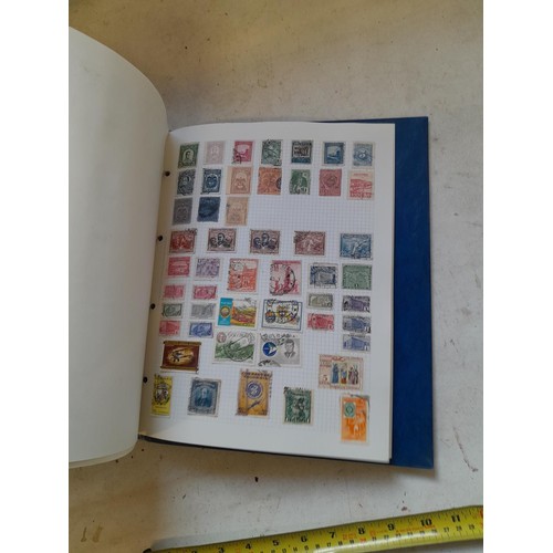 127 - Empty SG Windsor album and album of Stamps of the world mainly offered used, US interest