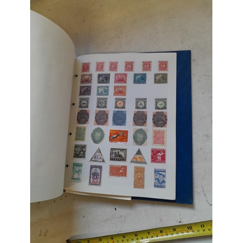 127 - Empty SG Windsor album and album of Stamps of the world mainly offered used, US interest