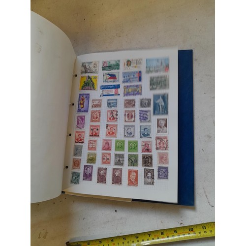 127 - Empty SG Windsor album and album of Stamps of the world mainly offered used, US interest